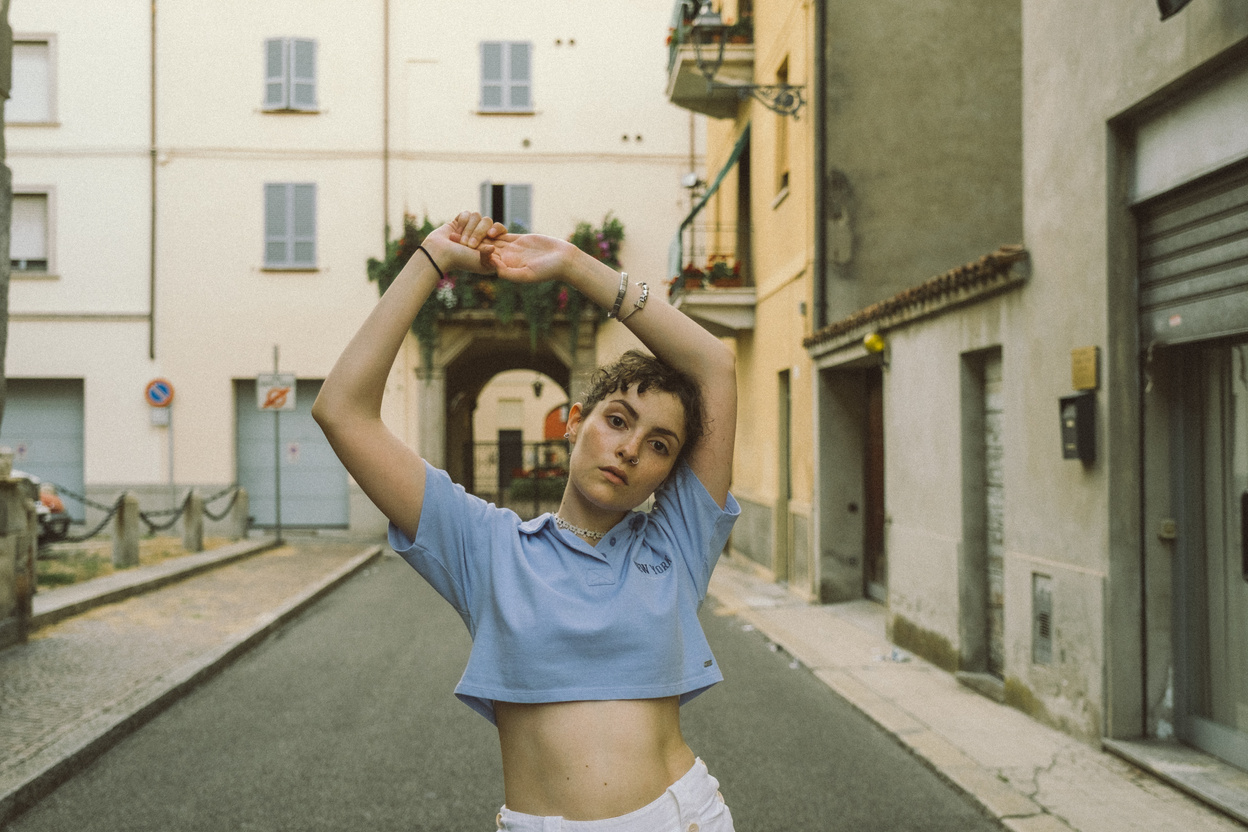 Woman Posing in the Middle of the Street 