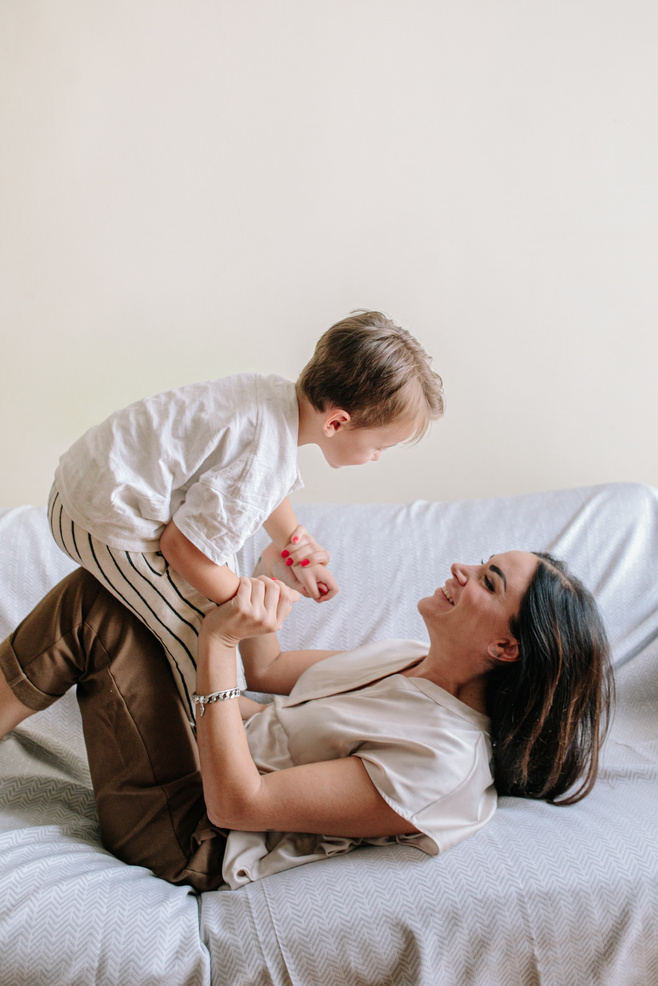 Mother Playing with Son at Home 