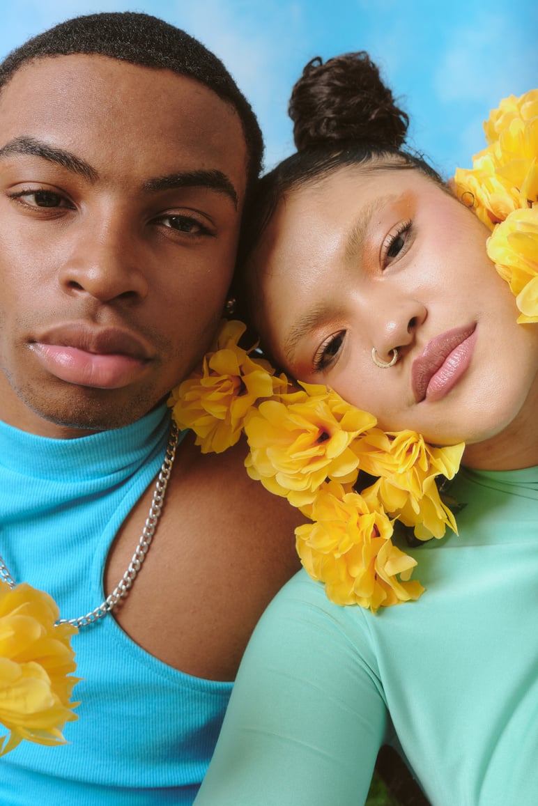 Portrait of Two Young Friends with Flowers