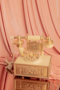 Vintage Telephone against the Pink Curtain