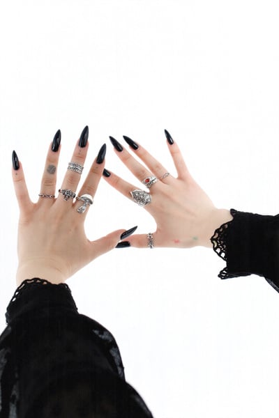 Woman with Black Long Nails