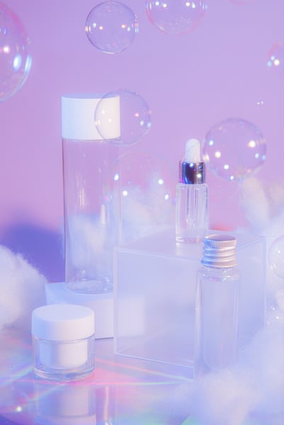 Various Transparent Cosmetic Bottles with Bubbles